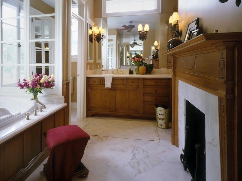 Fireplace Design Ideas For Custom Homes and Major Remodels - Stained Wood Mantel Coordinated With Built-In Cabinetry